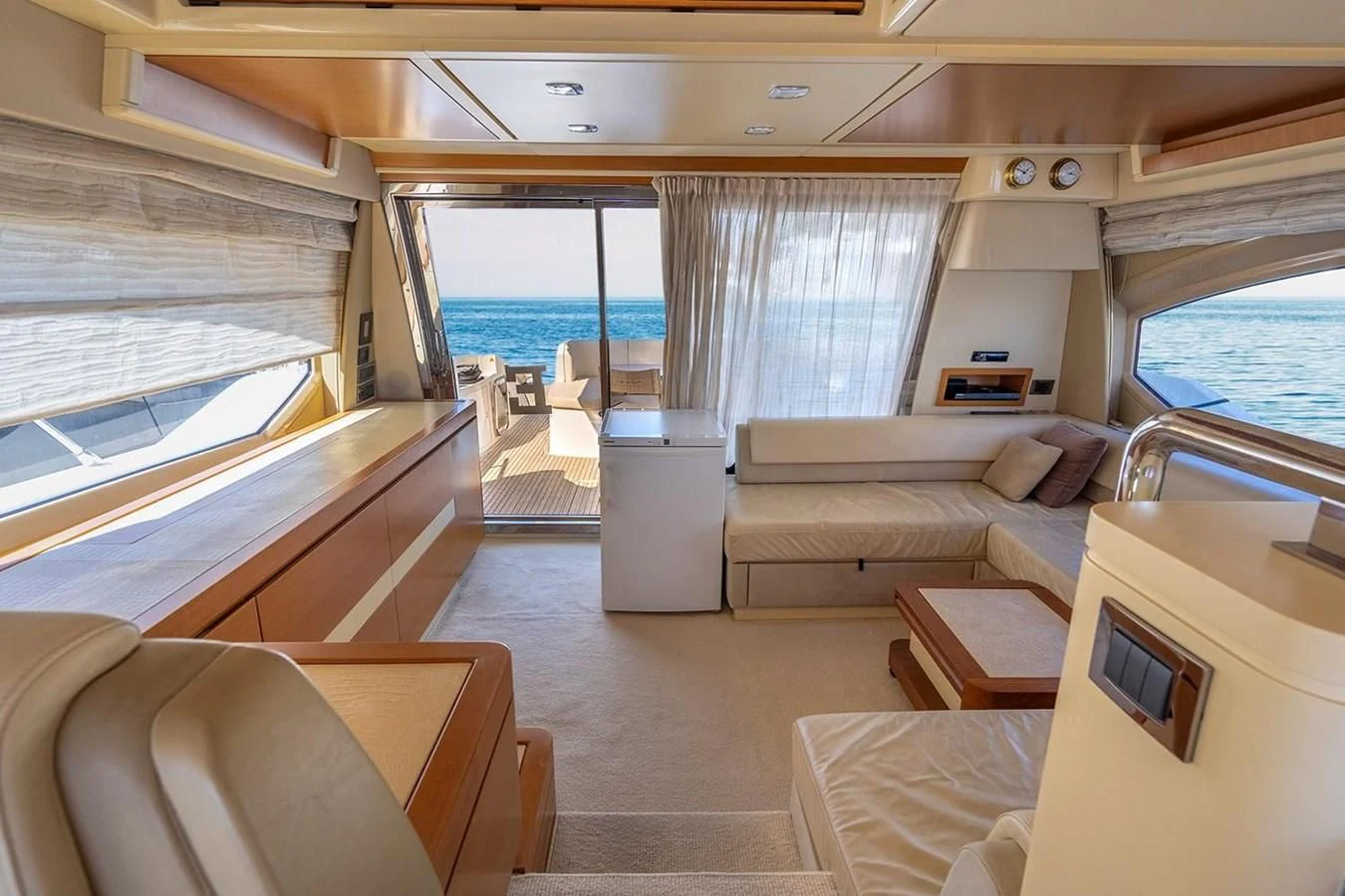 a room with a view of the ocean and the deck aboard ELENA I Yacht for Sale
