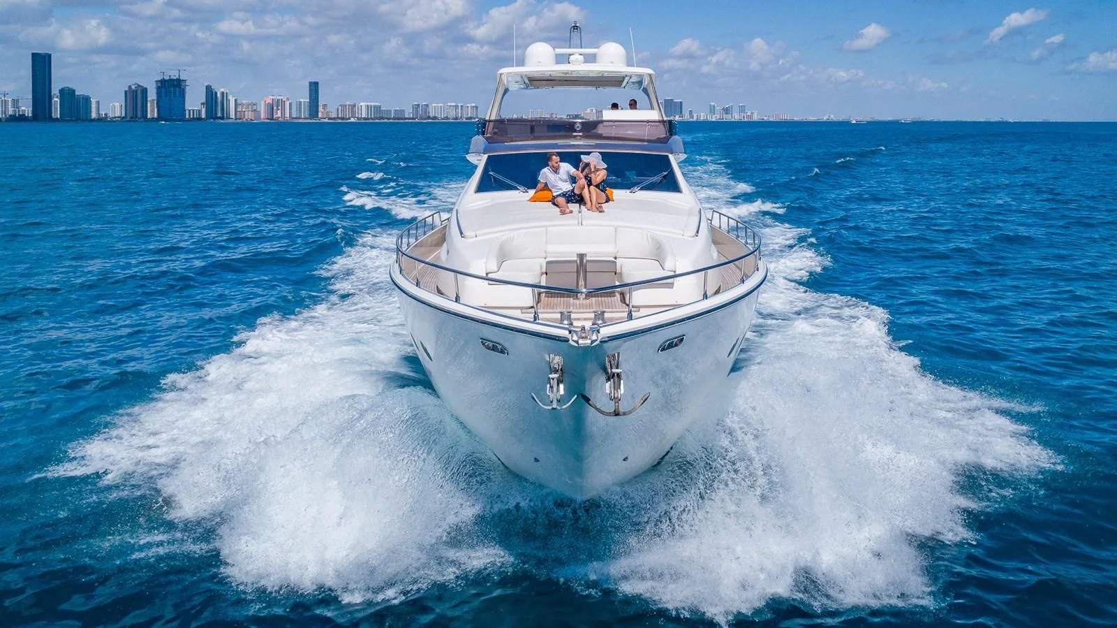 a white boat on the water aboard GOLDEN BELLE Yacht for Sale
