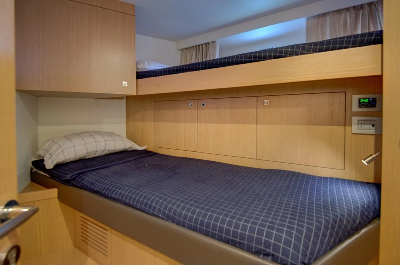 a bed in a room aboard GOLDEN BELLE Yacht for Sale