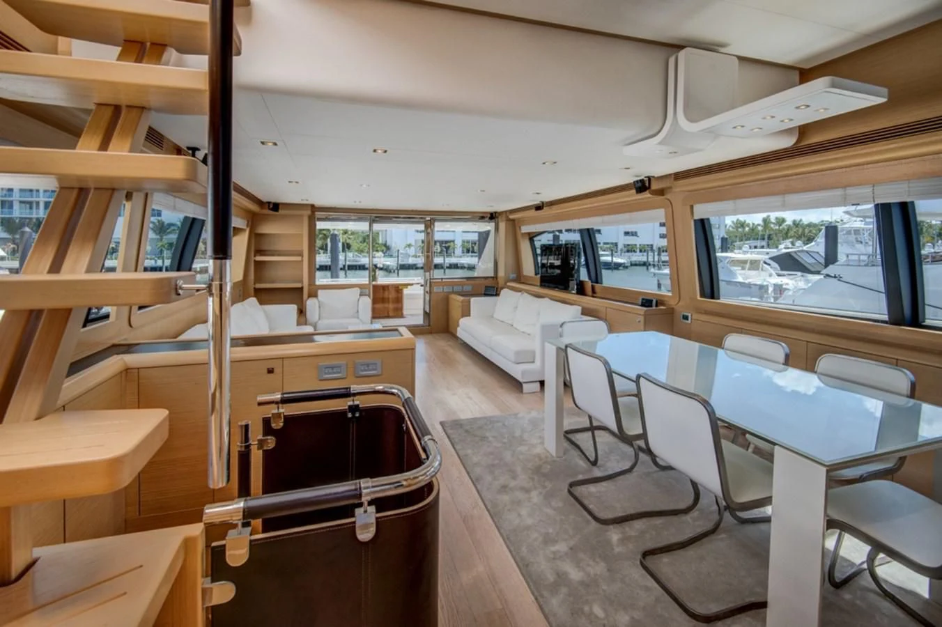 a room with a bed and desk aboard GOLDEN BELLE Yacht for Sale