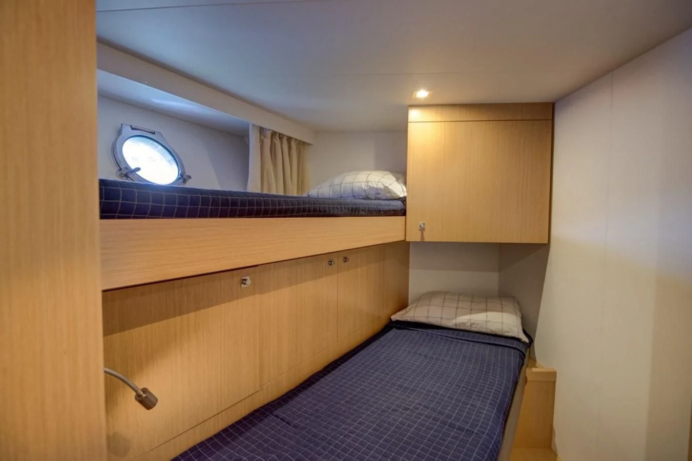 a bed in a room aboard GOLDEN BELLE Yacht for Sale