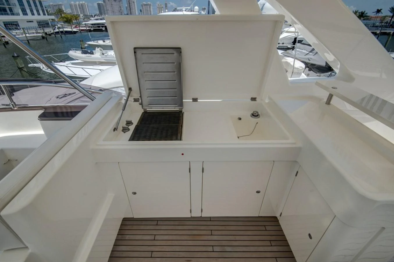 a white building with a black staircase aboard GOLDEN BELLE Yacht for Sale