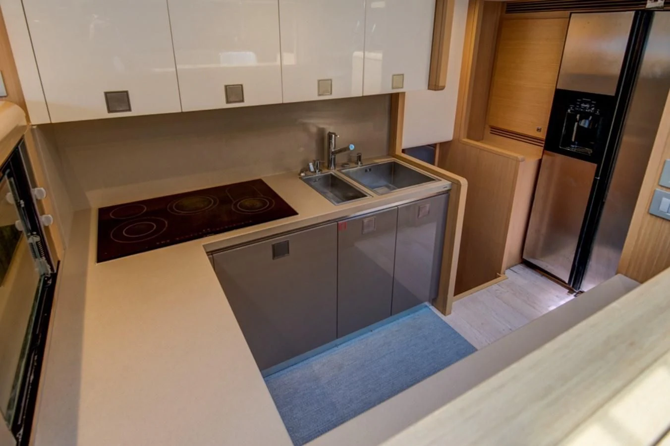 a kitchen with a stove and sink aboard GOLDEN BELLE Yacht for Sale
