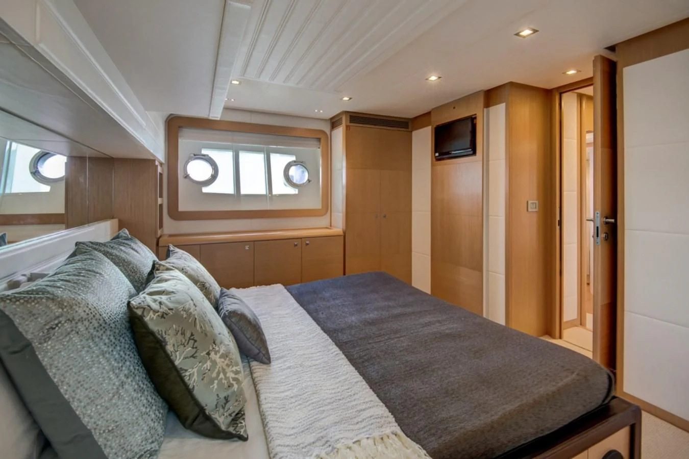 a bed in a room aboard GOLDEN BELLE Yacht for Sale