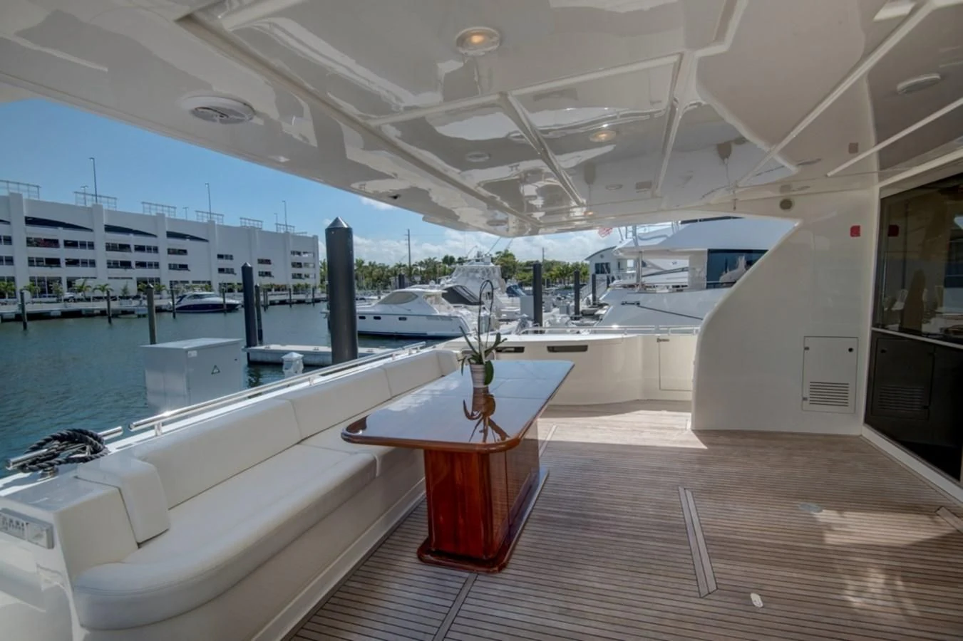 a room with a table and chairs aboard GOLDEN BELLE Yacht for Sale