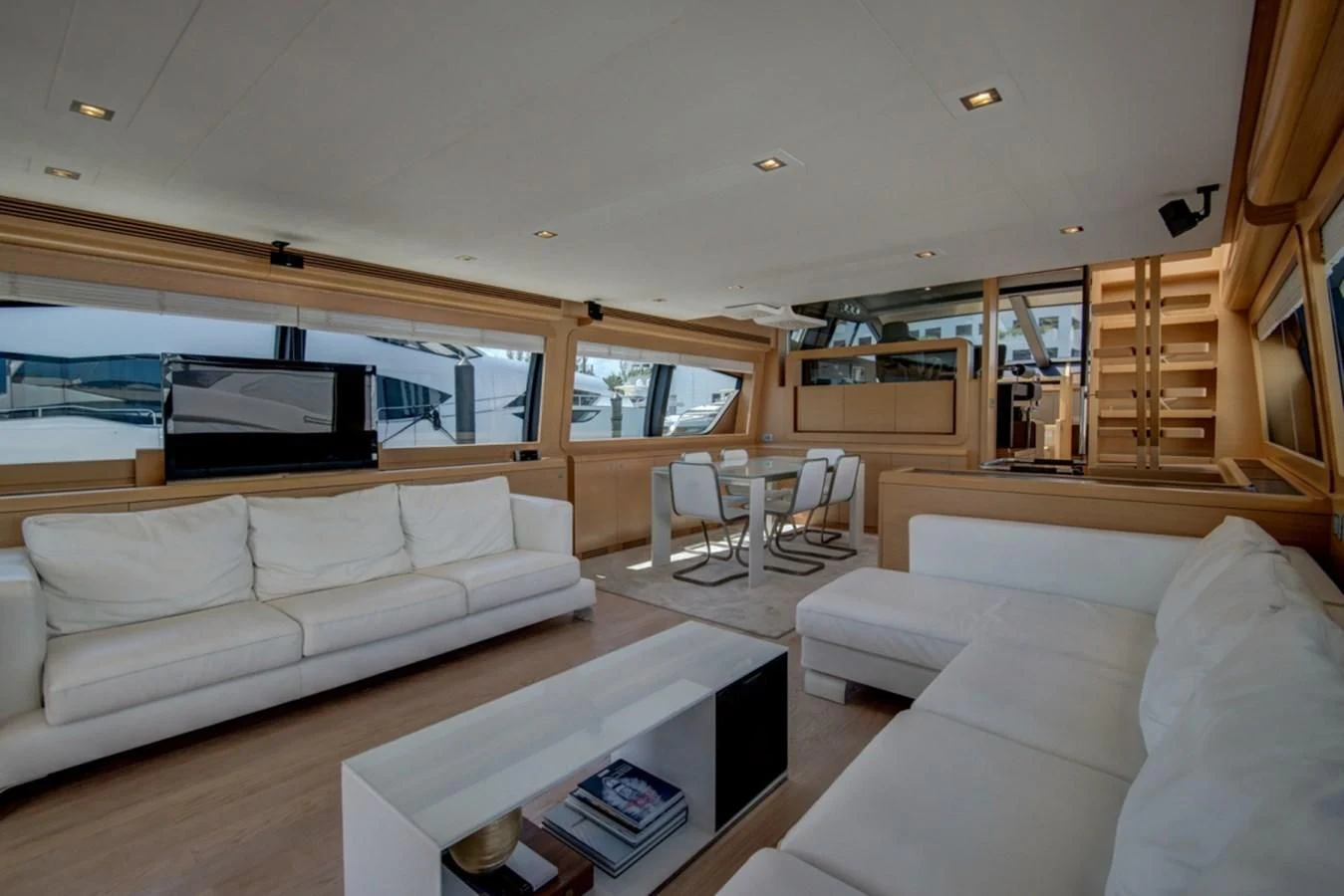 a living room with a large window aboard GOLDEN BELLE Yacht for Sale