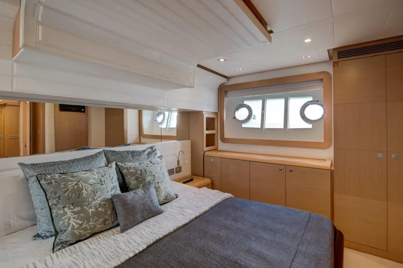 a bed with pillows aboard GOLDEN BELLE Yacht for Sale