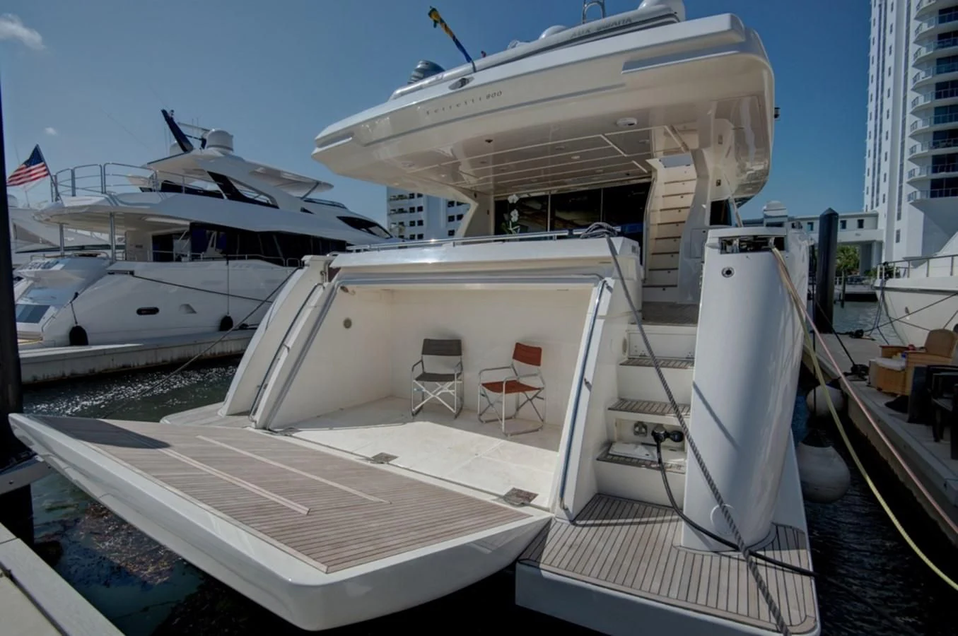 a boat docked at a pier aboard GOLDEN BELLE Yacht for Sale