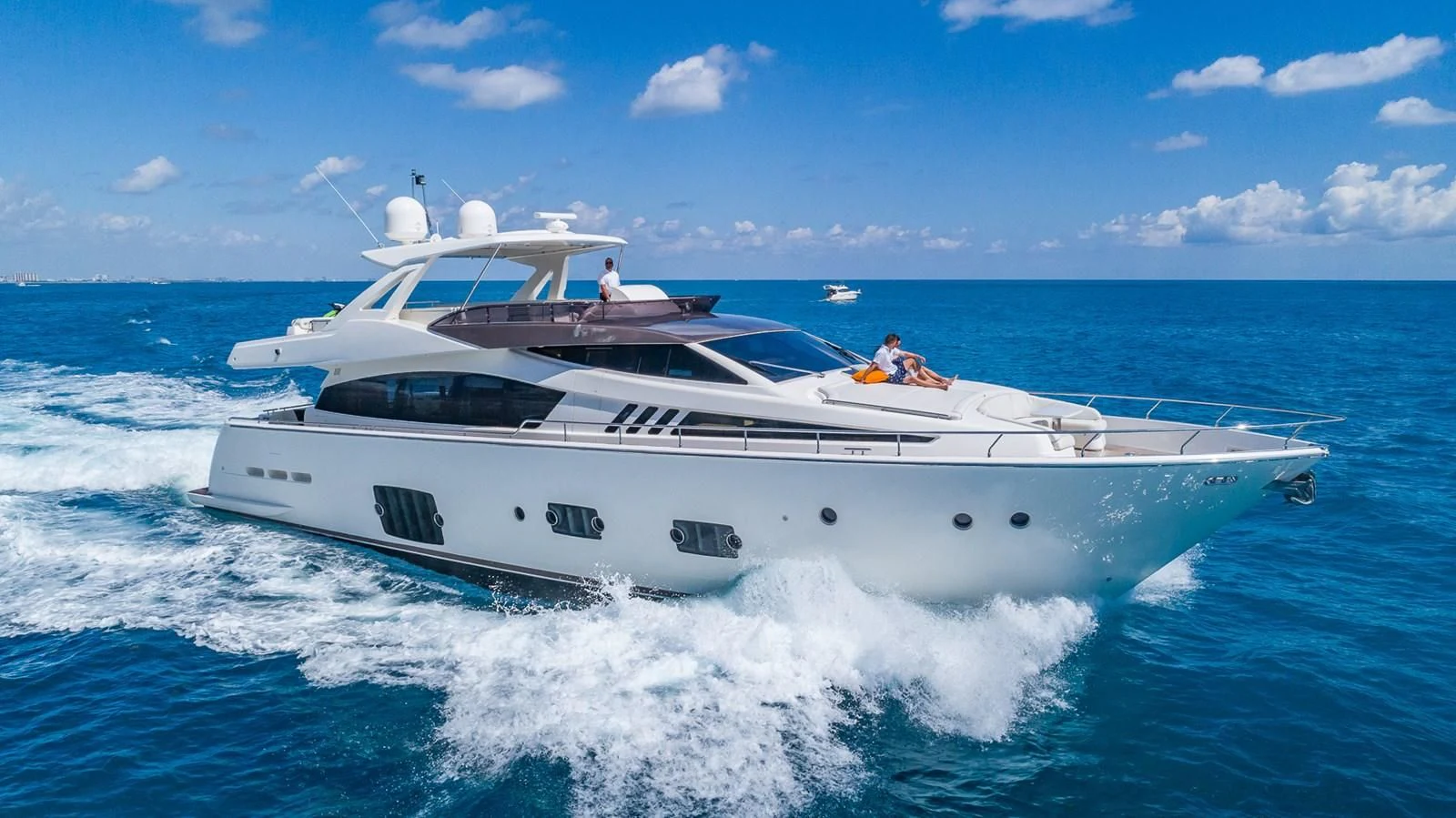 a white yacht on the water aboard GOLDEN BELLE Yacht for Sale
