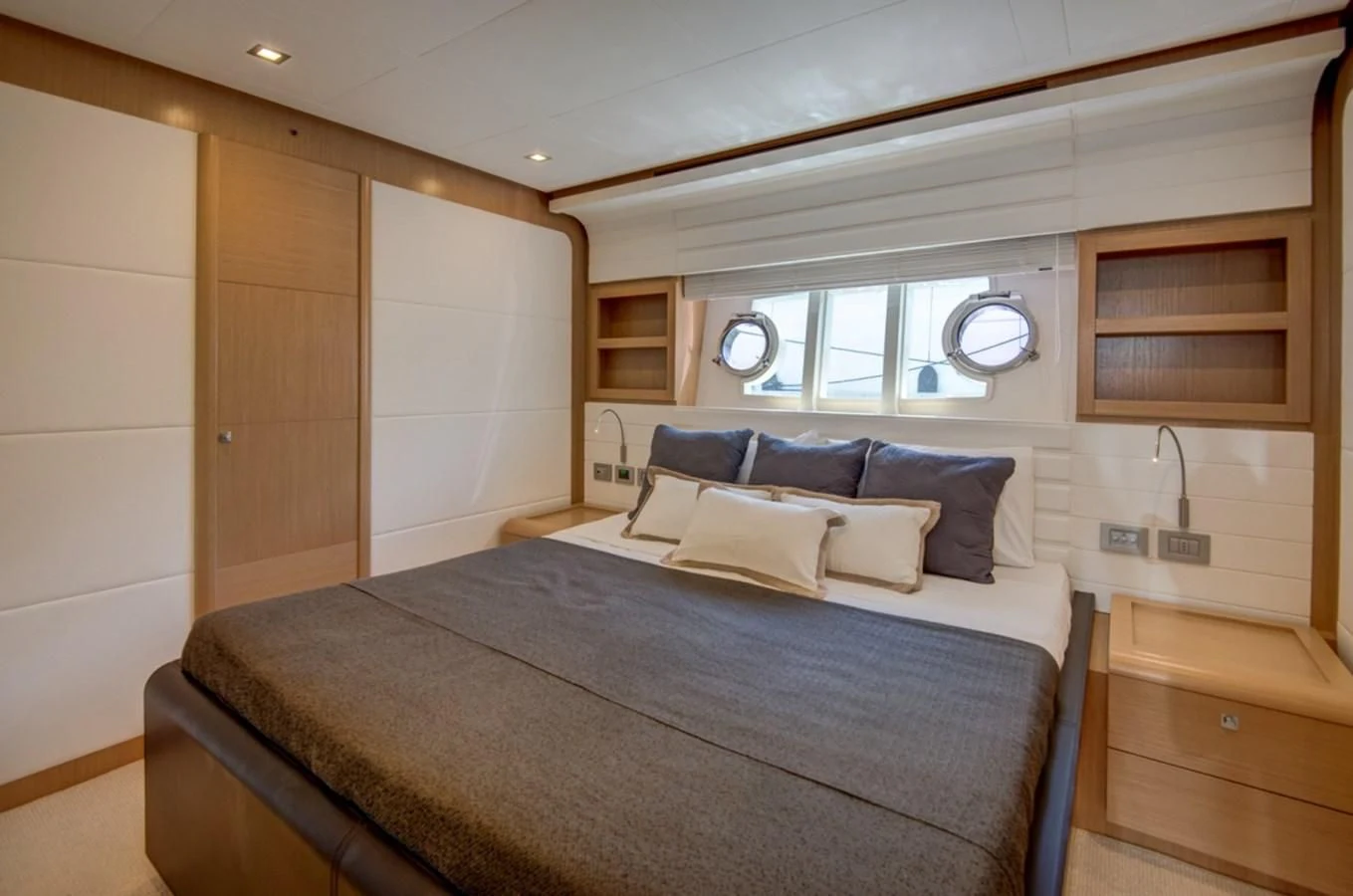 a bed in a room aboard GOLDEN BELLE Yacht for Sale