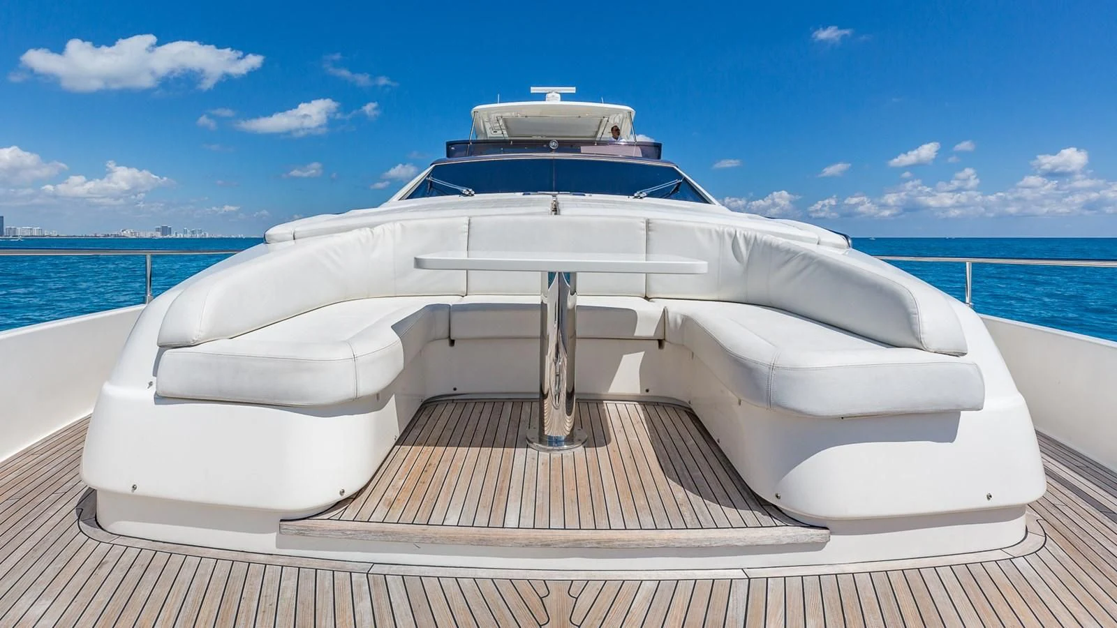 a white boat on a dock aboard GOLDEN BELLE Yacht for Sale