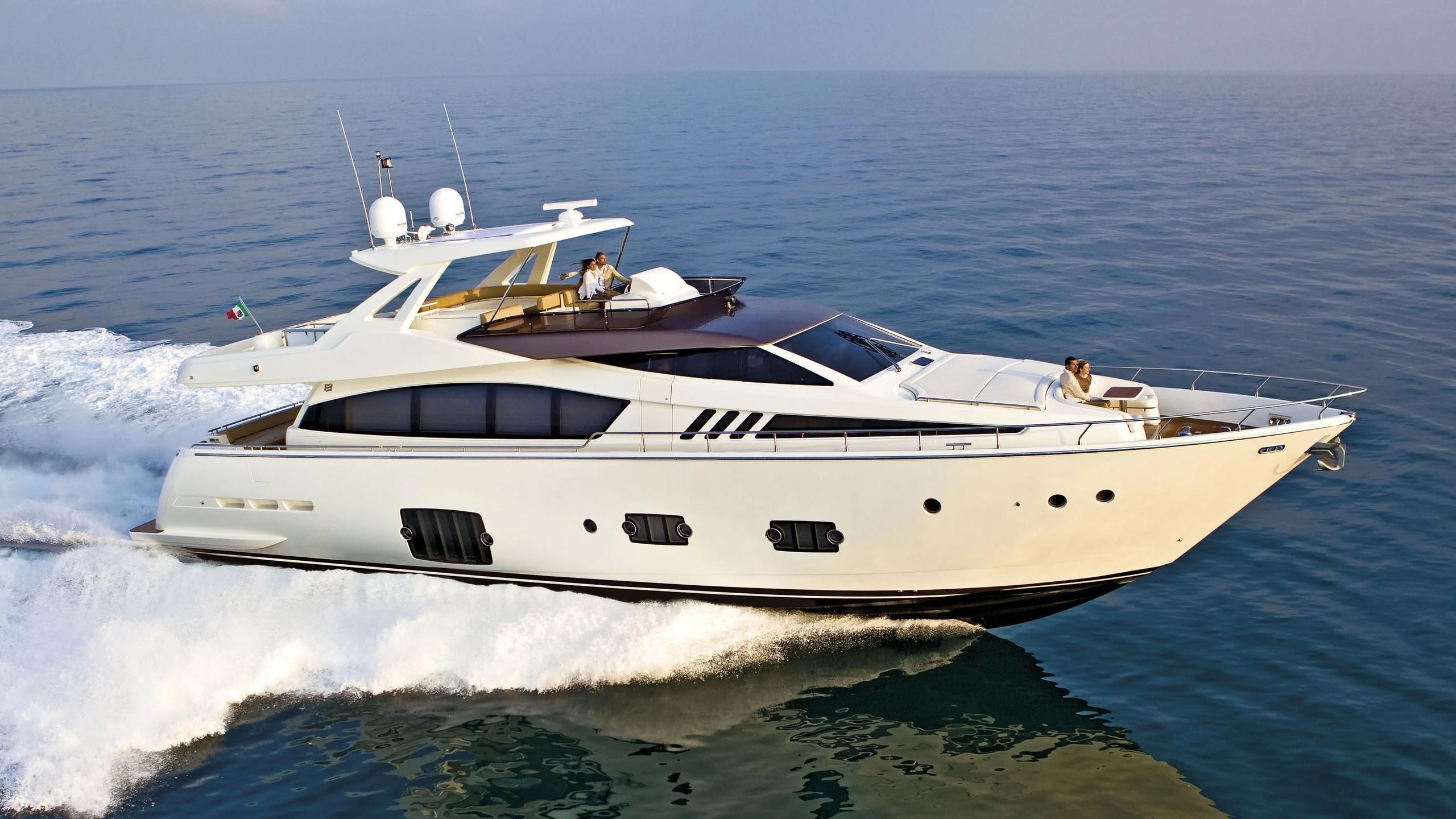 a white yacht on the water aboard GOLDEN BELLE Yacht for Sale