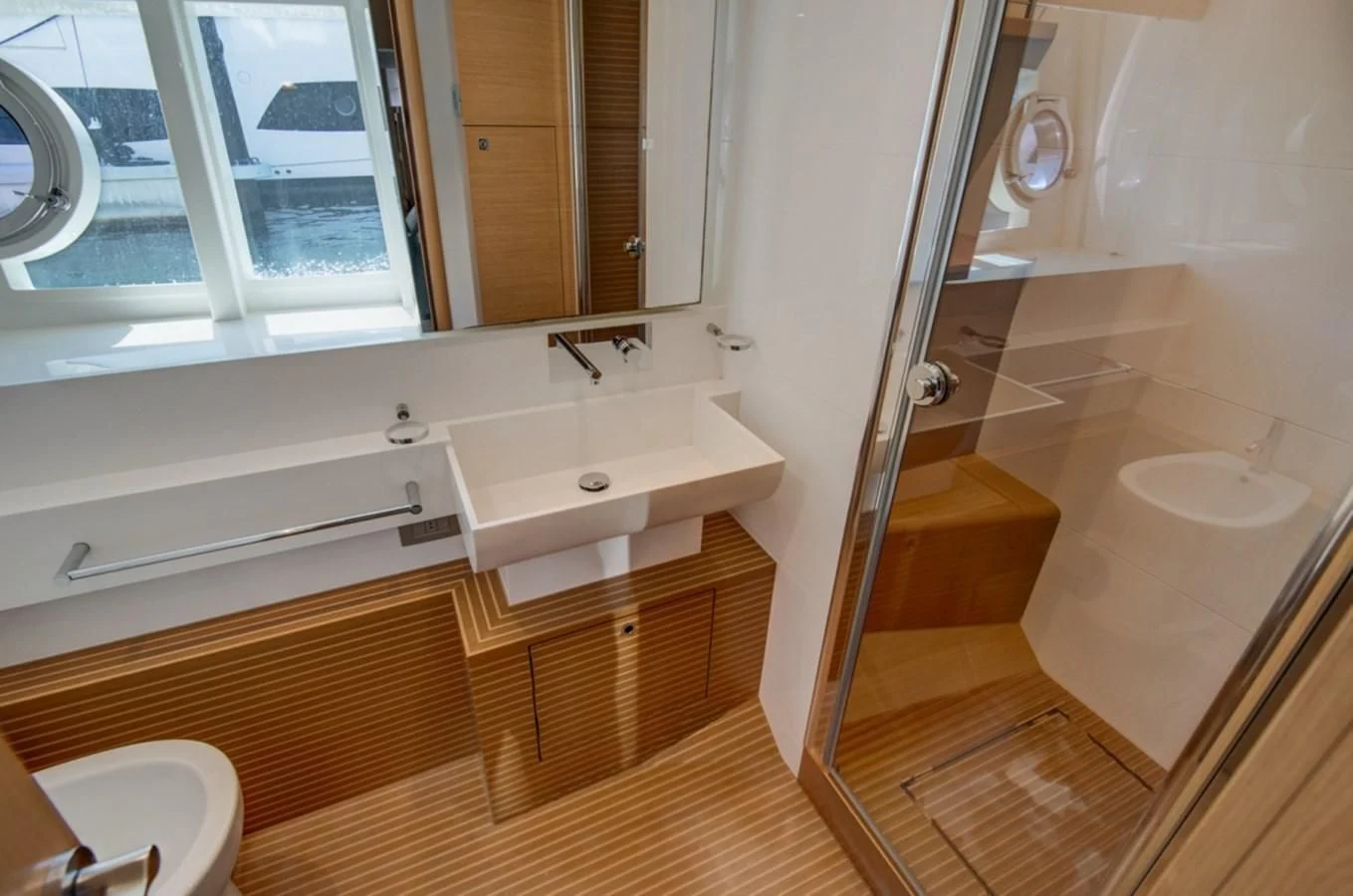 a bathroom with a sink and a shower aboard GOLDEN BELLE Yacht for Sale