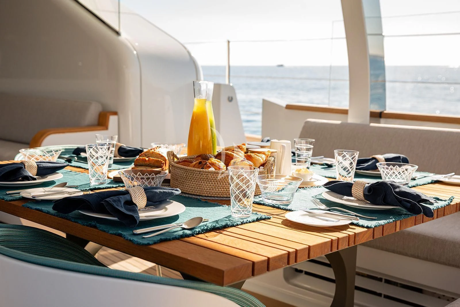 a table with food and drinks aboard SERENDIPITY I Yacht for Charter