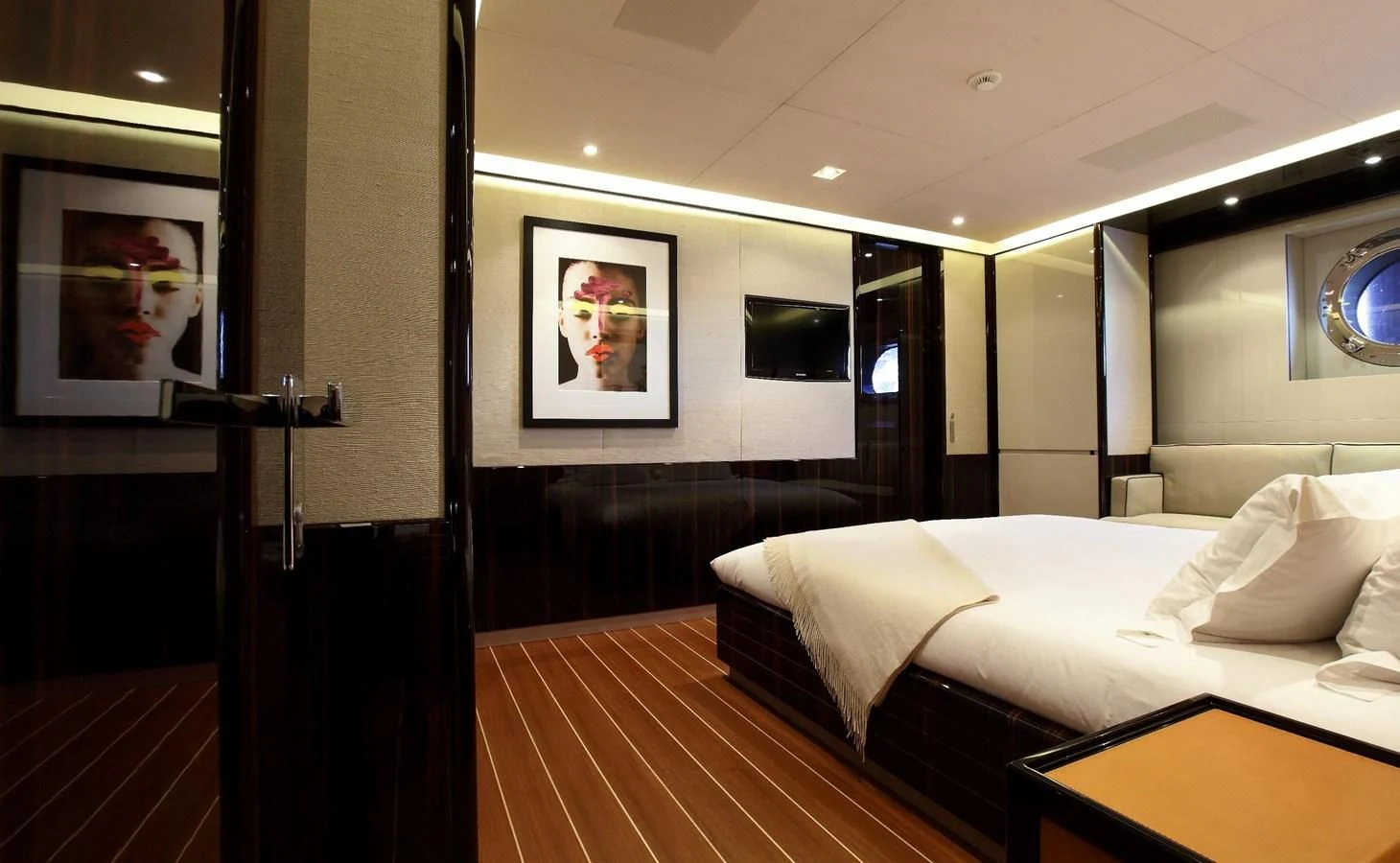 a hotel room with a bed aboard SERENDIPITY I Yacht for Charter