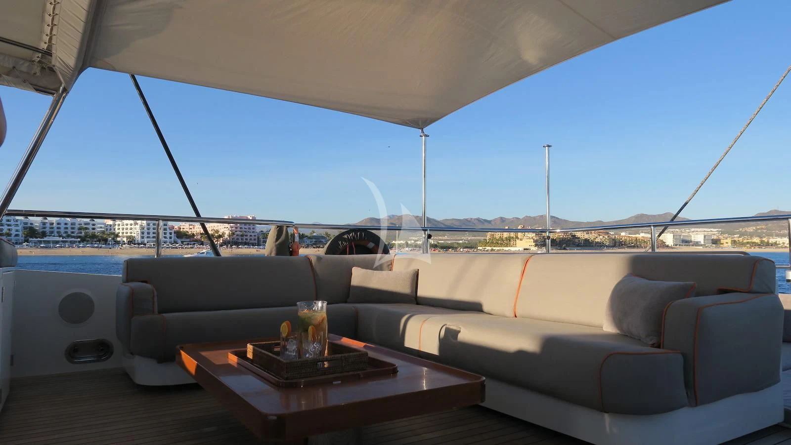 a couch and a table on a boat aboard SERENDIPITY I Yacht for Charter