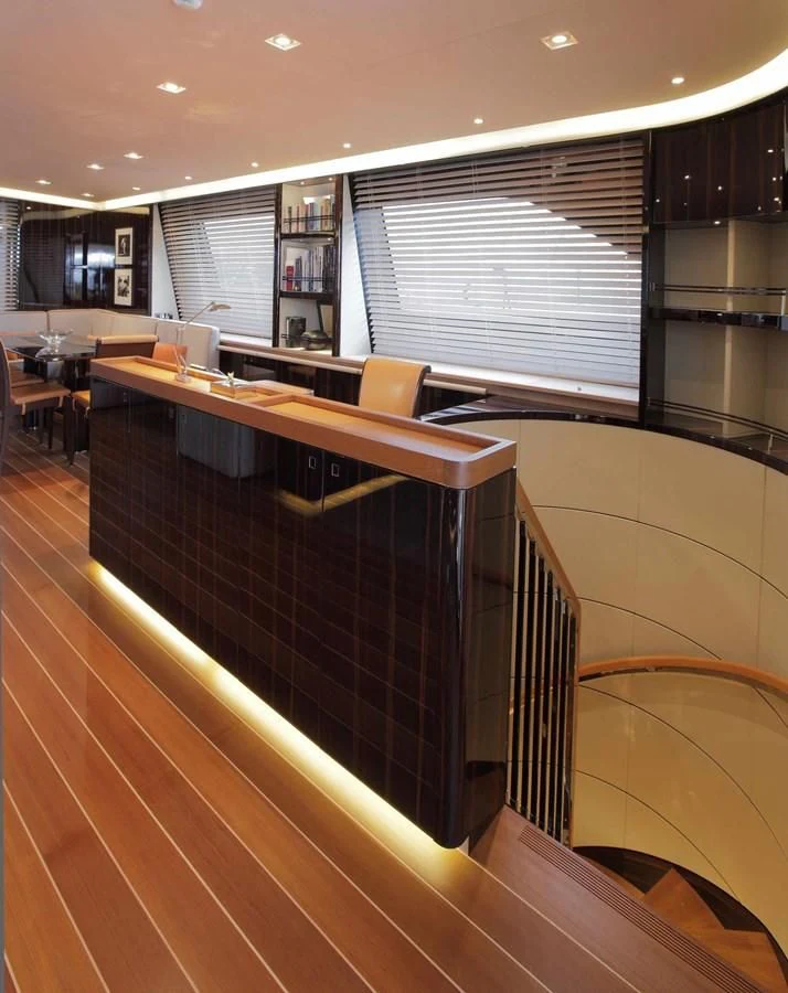 a room with a table and chairs aboard SERENDIPITY I Yacht for Charter