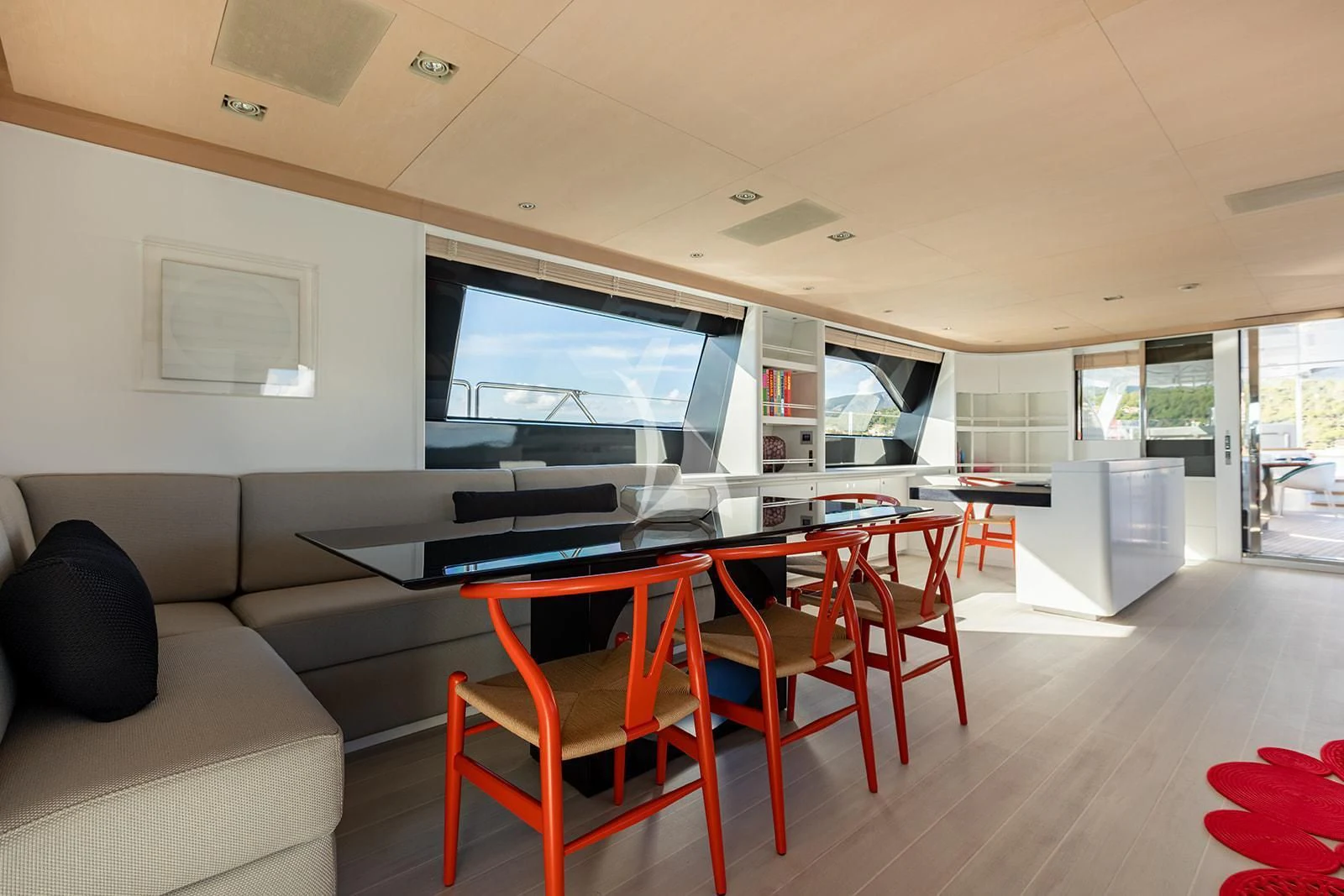 a living room with a large screen aboard SERENDIPITY I Yacht for Charter