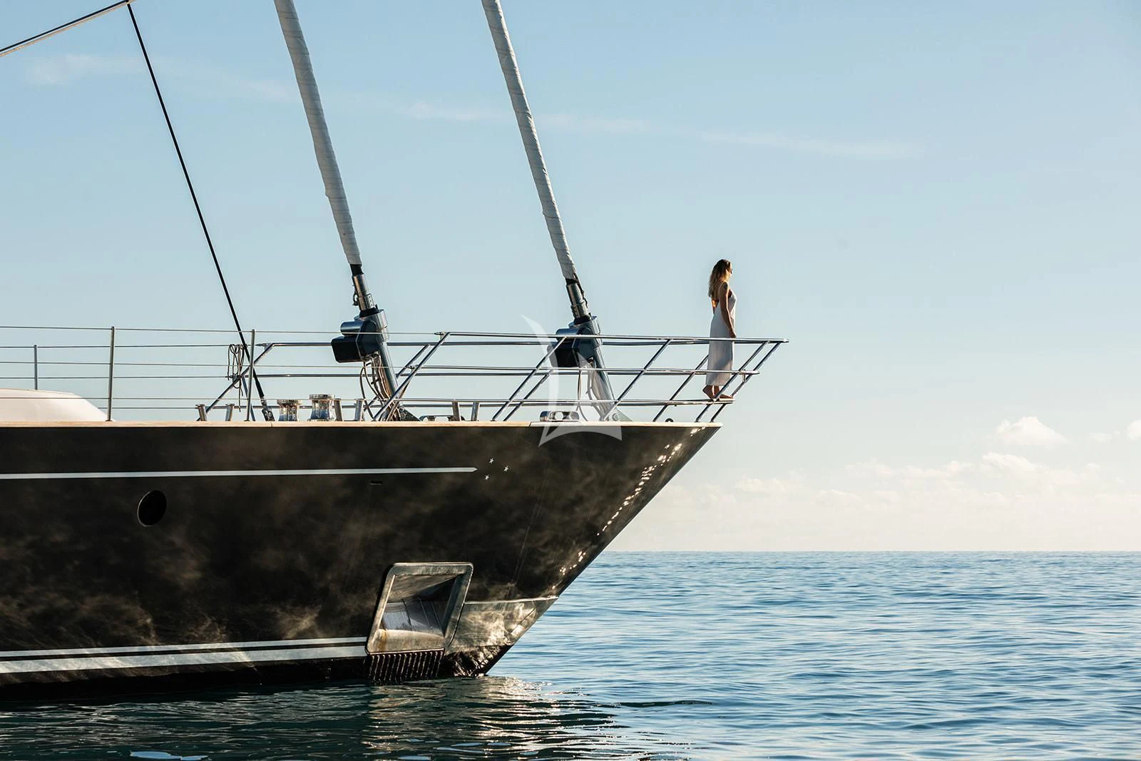 a person standing on a large boat aboard SERENDIPITY I Yacht for Charter