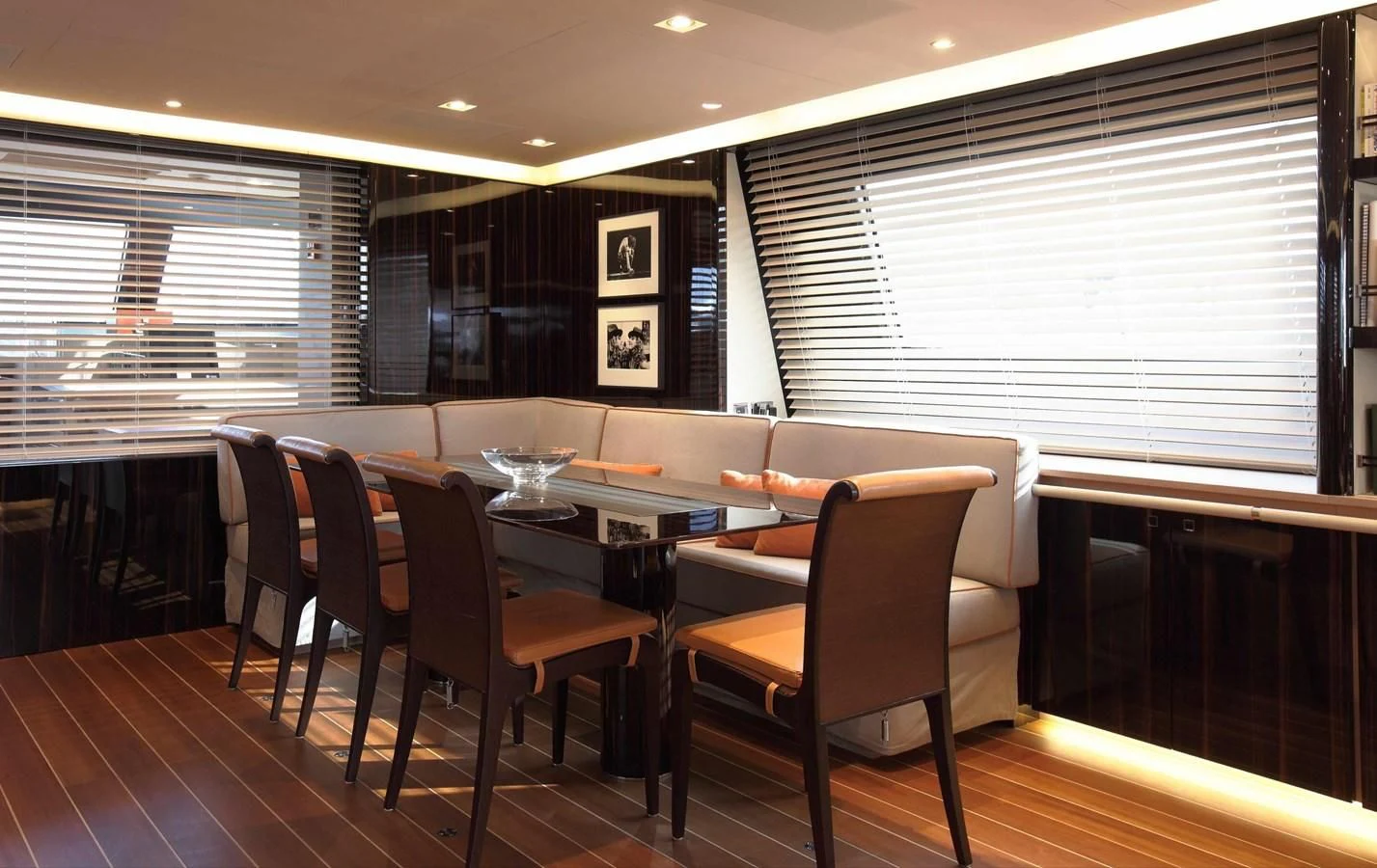a dining room with a table and chairs aboard SERENDIPITY I Yacht for Charter