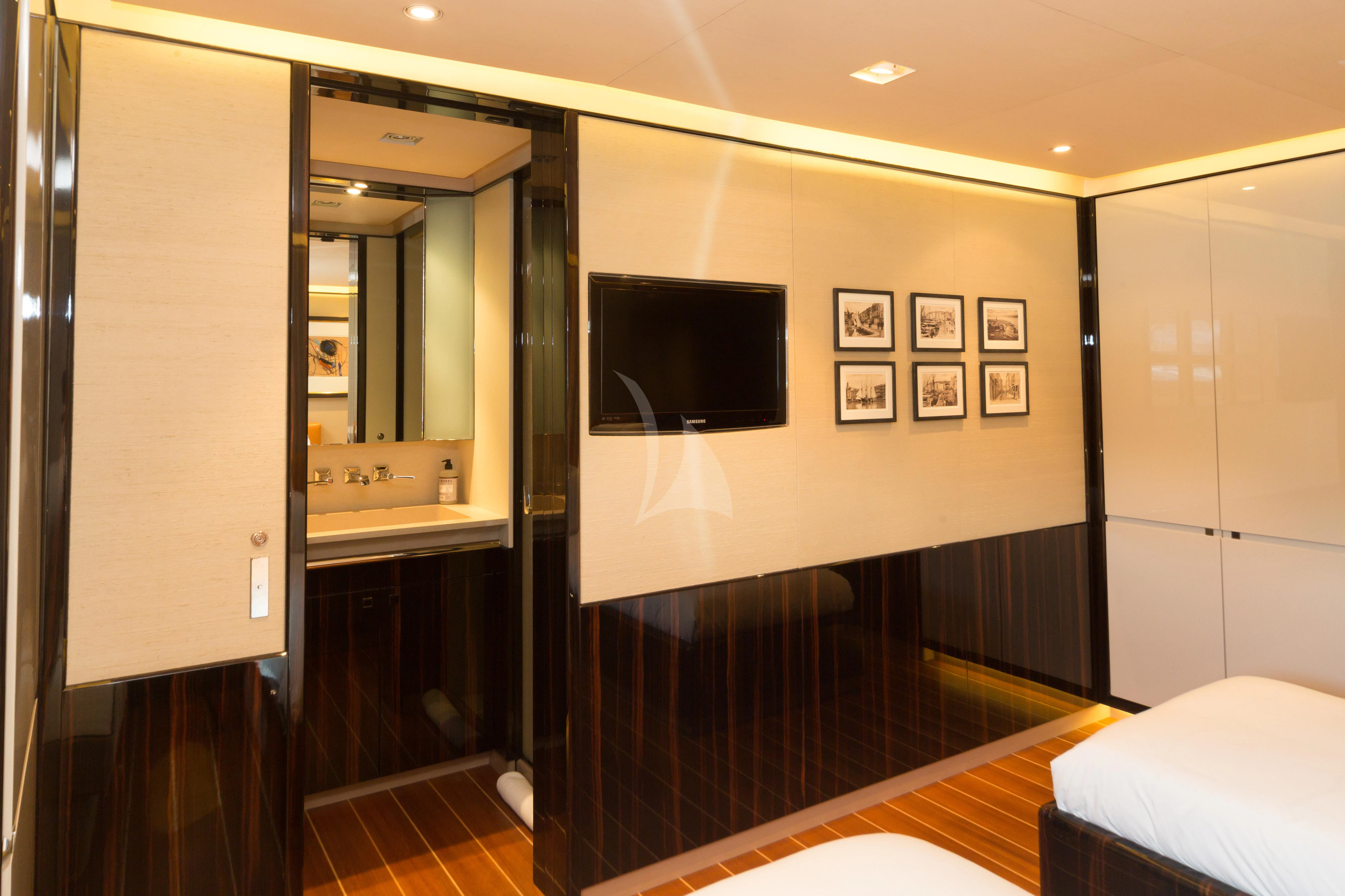 a bathroom with a large mirror aboard SERENDIPITY I Yacht for Charter