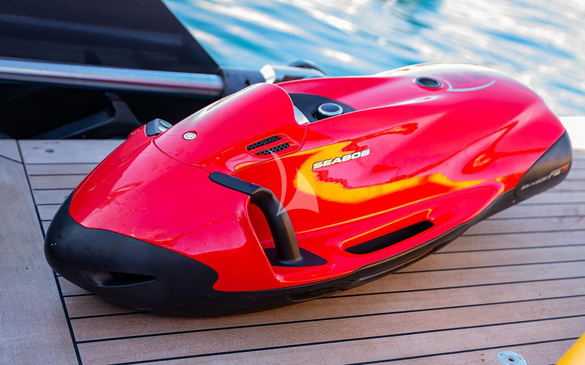 a red sports car aboard SERENDIPITY I Yacht for Charter