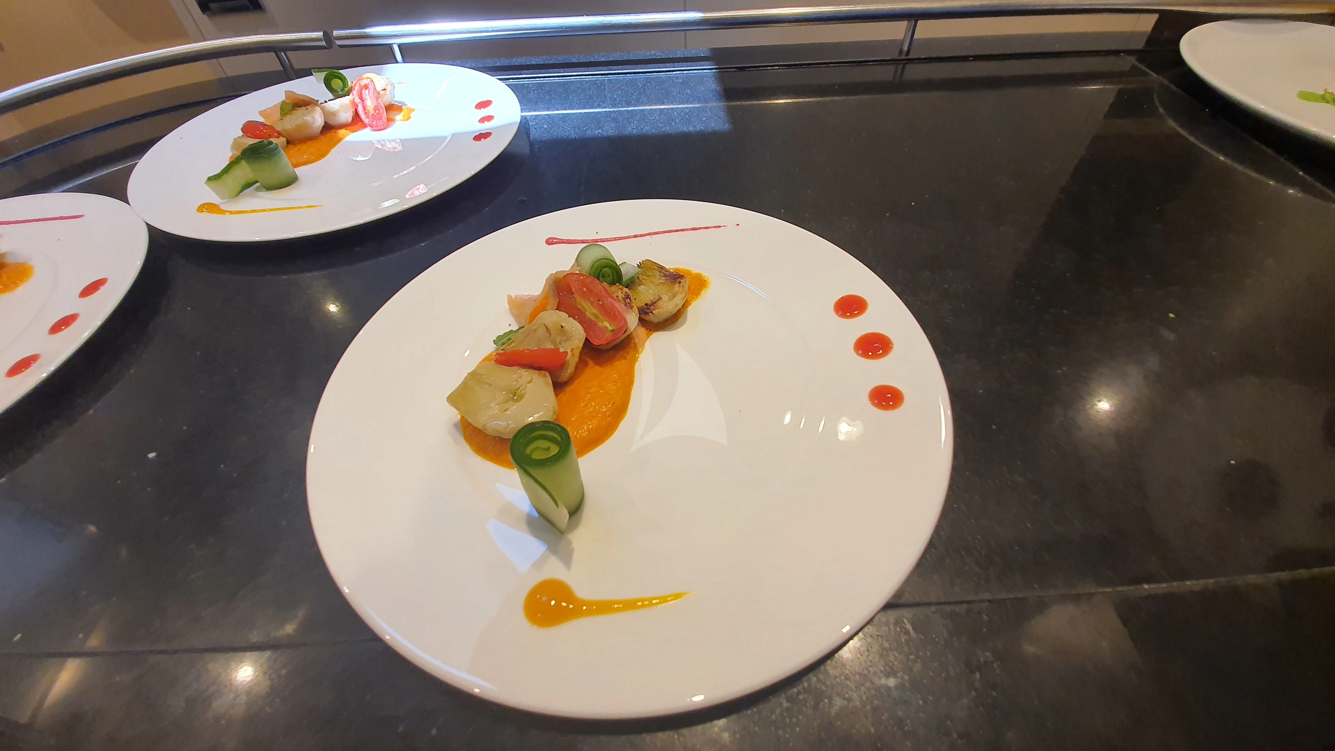 a plate of food aboard SERENDIPITY I Yacht for Charter