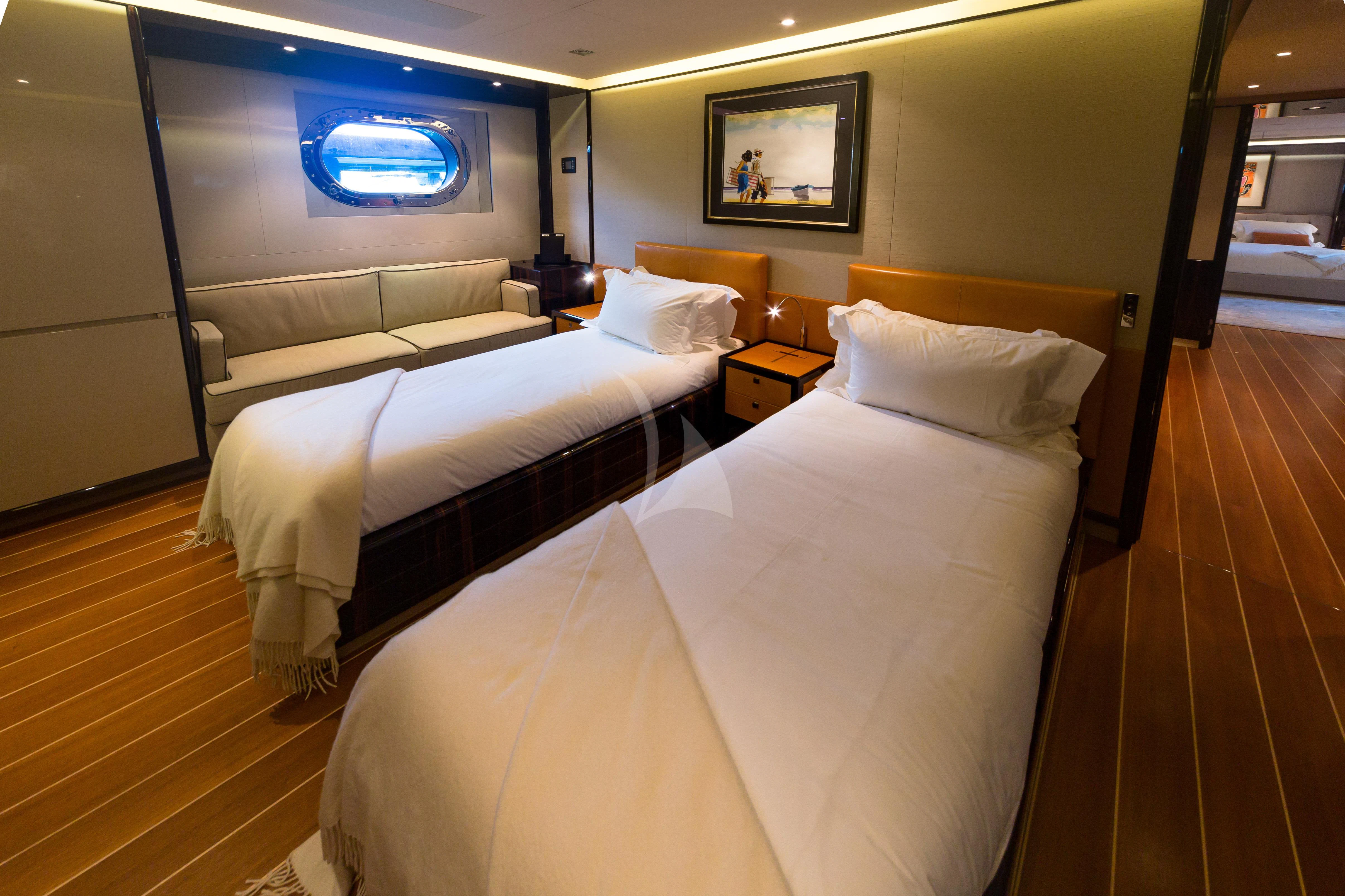 a room with two beds aboard SERENDIPITY I Yacht for Charter