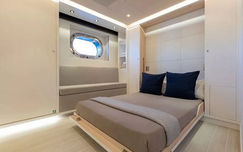 a bed in a room aboard SERENDIPITY I Yacht for Charter