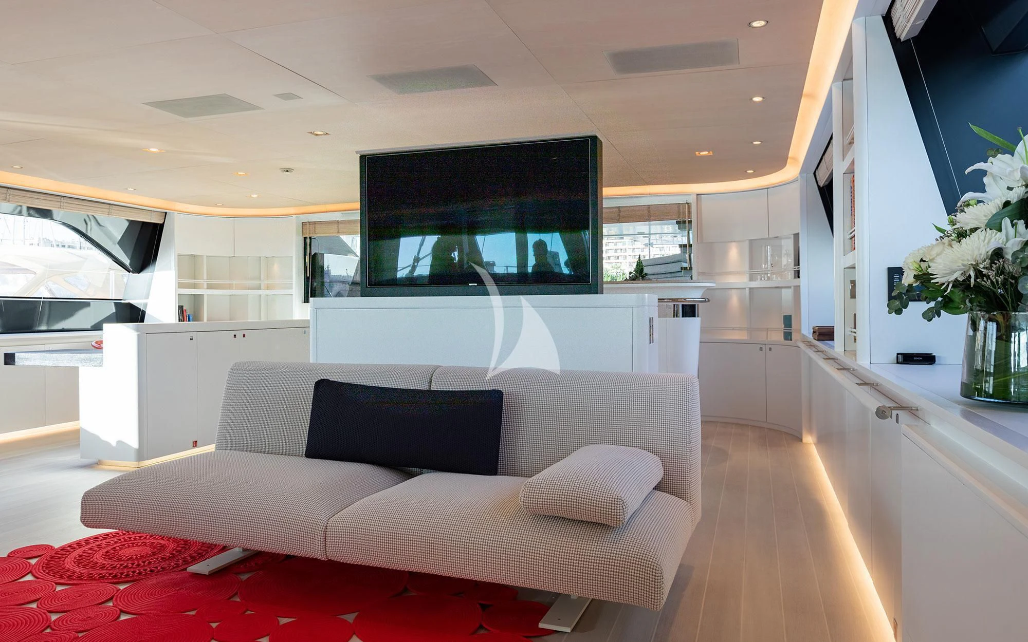 a white couch in a room aboard SERENDIPITY I Yacht for Charter