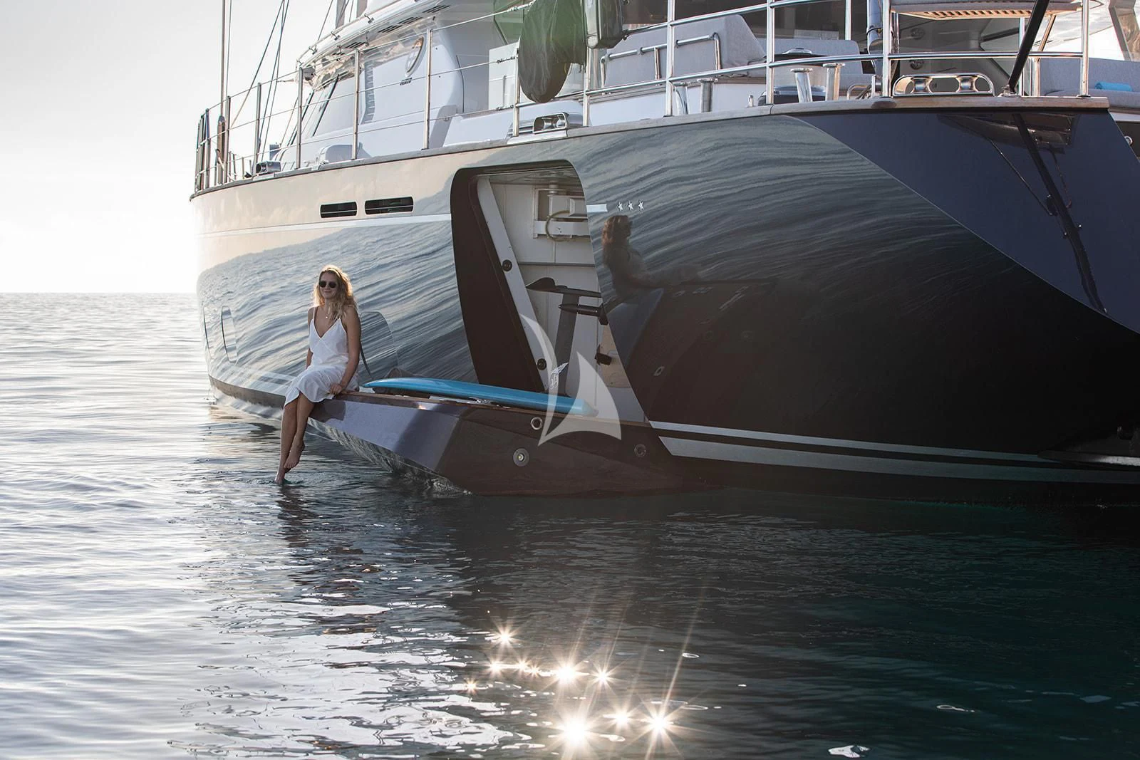 a person sitting on a boat aboard SERENDIPITY I Yacht for Charter