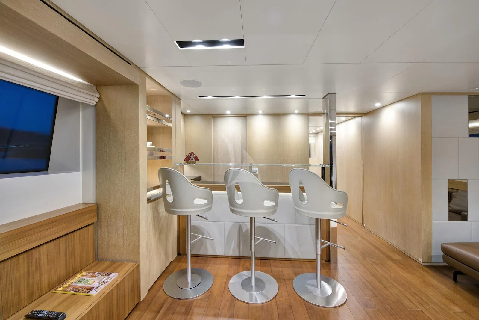 a room with chairs and tables aboard THERAPY Yacht for Sale