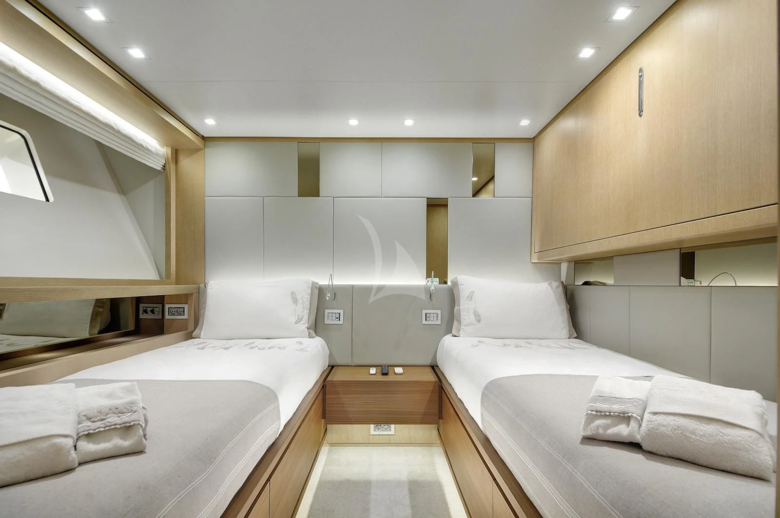 a bathroom with white cabinets aboard THERAPY Yacht for Sale
