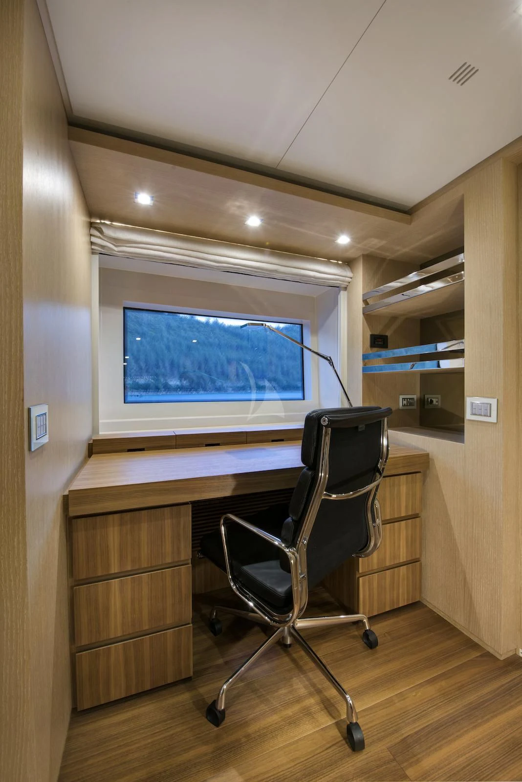 a chair in a room aboard THERAPY Yacht for Sale