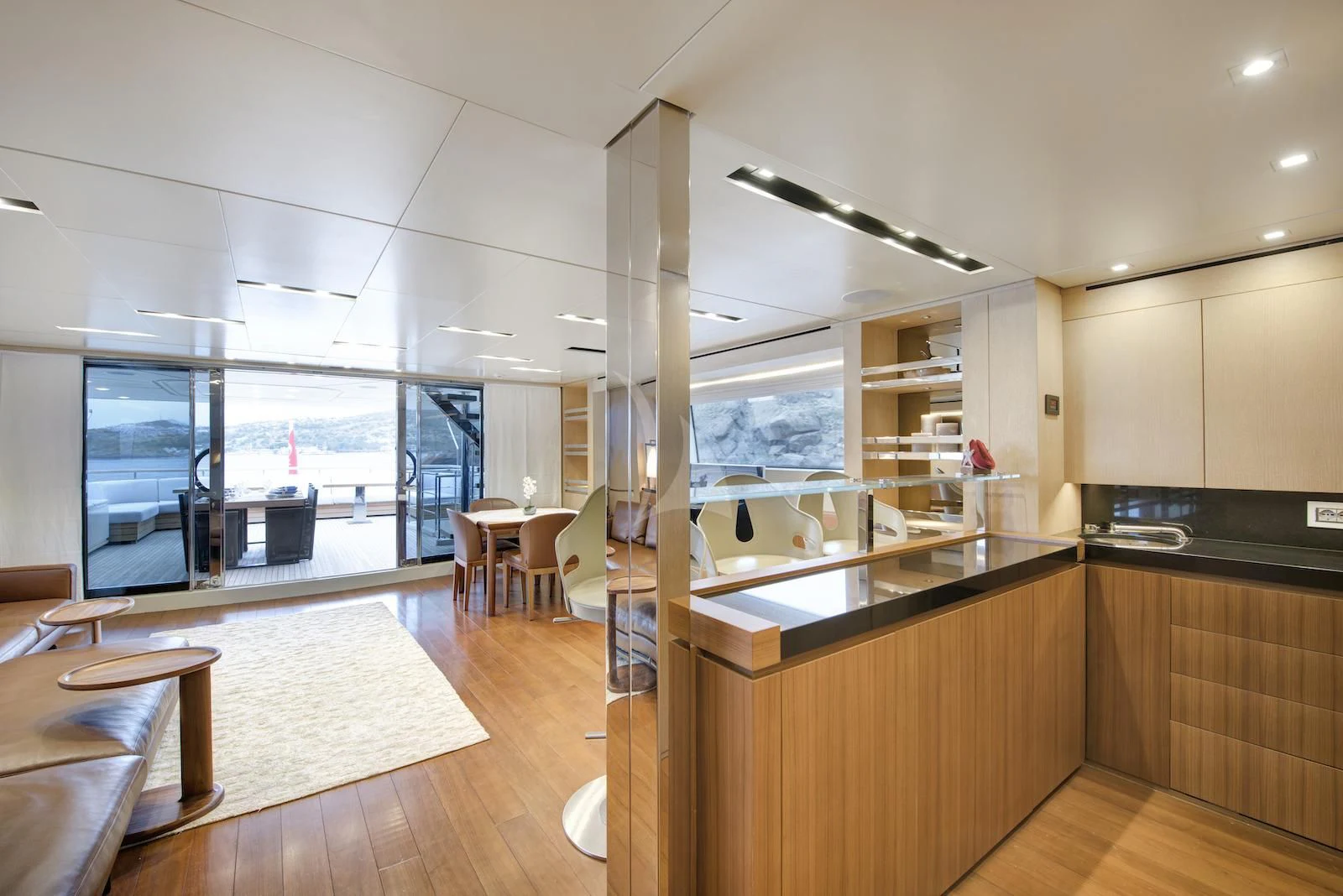 a kitchen with a large window aboard THERAPY Yacht for Sale