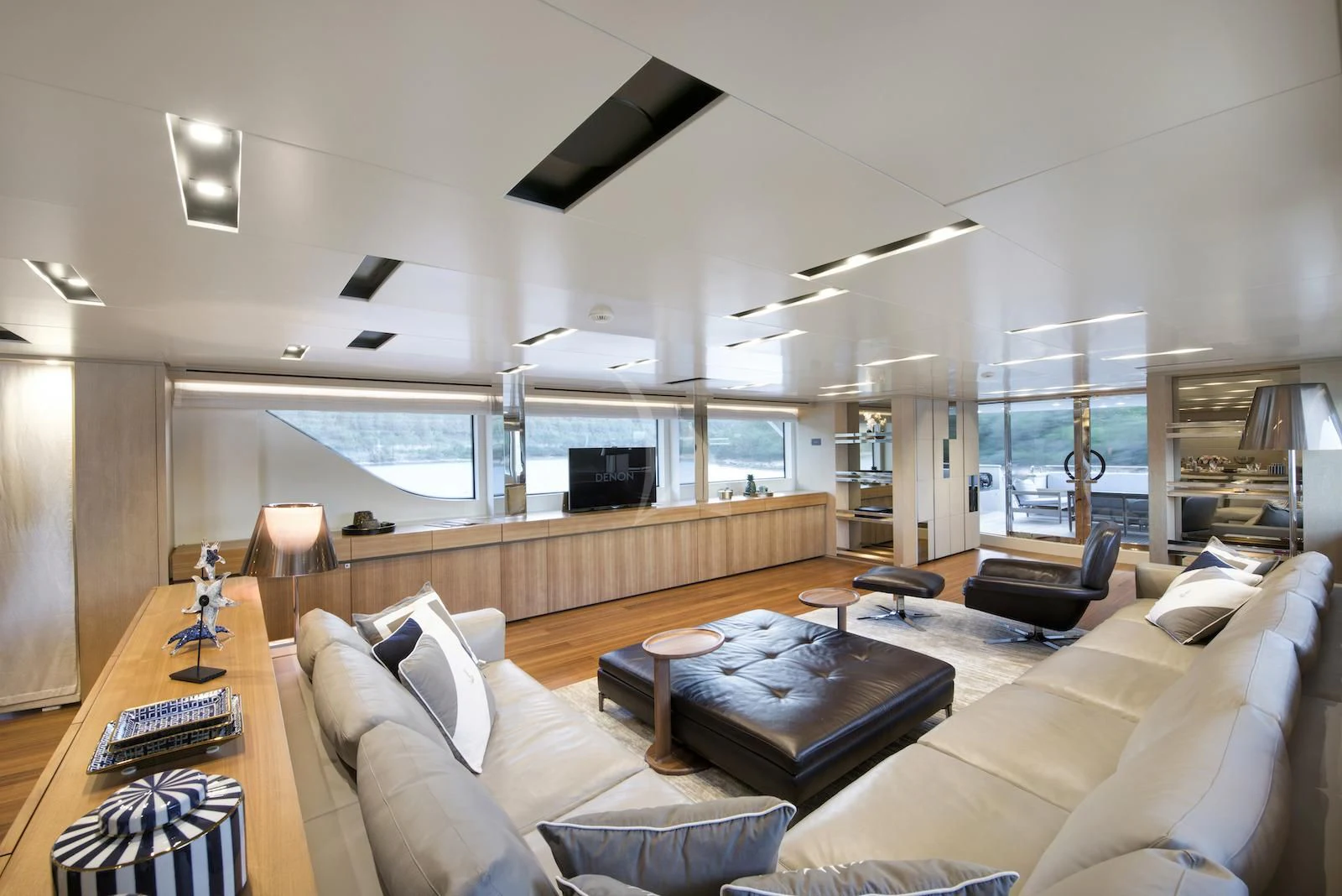 a living room with a large window aboard THERAPY Yacht for Sale