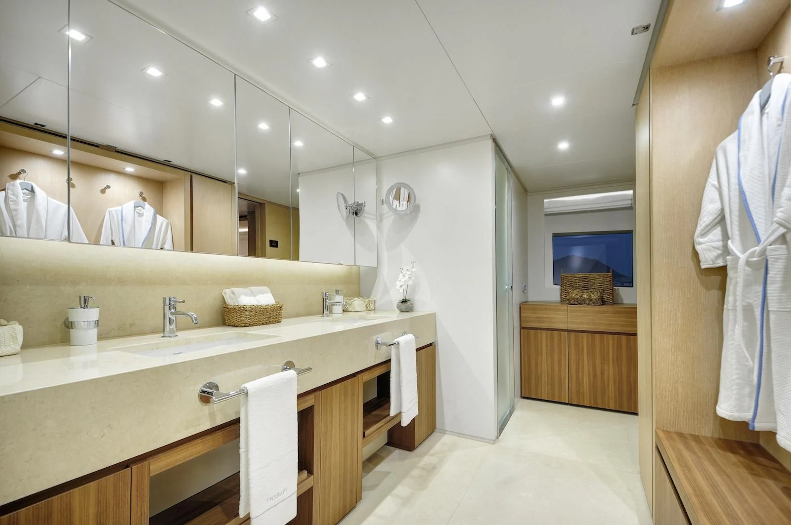 a bathroom with a countertop sink and a mirror aboard THERAPY Yacht for Sale