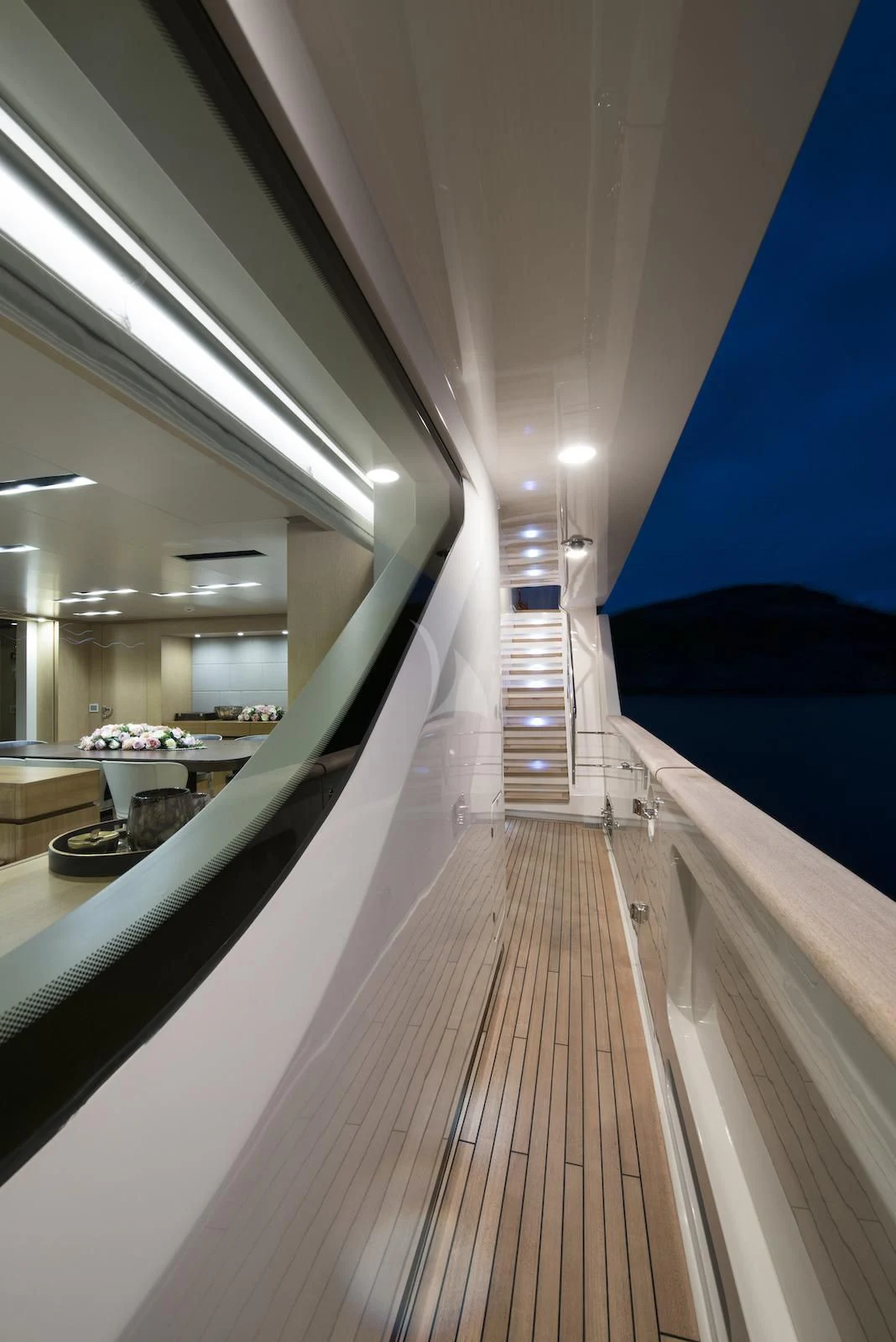 a long wooden bridge aboard THERAPY Yacht for Sale