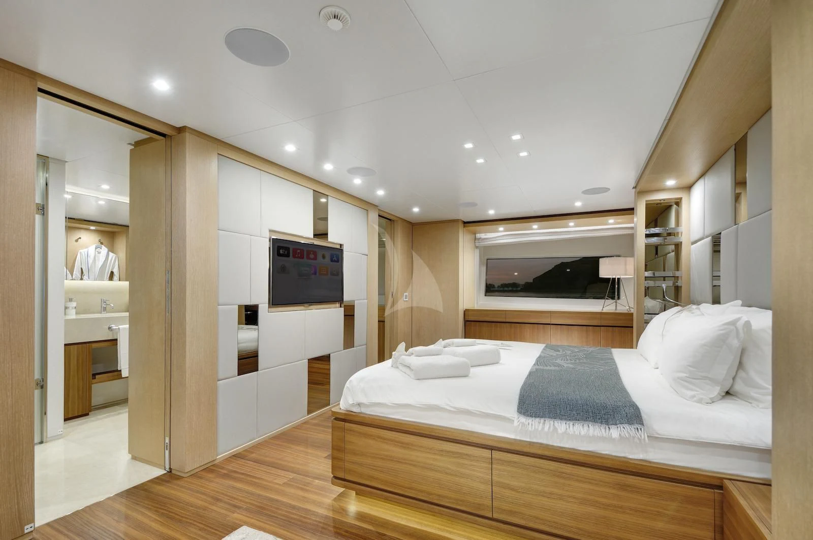 a bedroom with a large bed aboard THERAPY Yacht for Sale