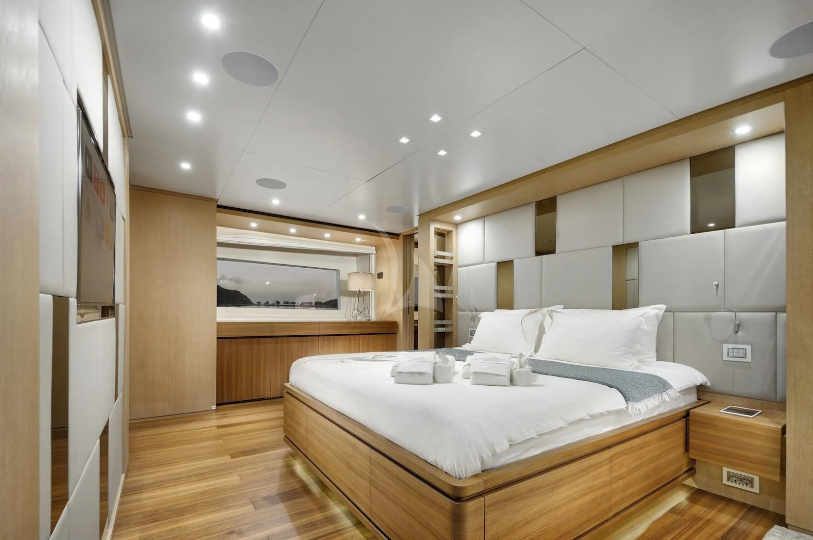 a bedroom with a large bed aboard THERAPY Yacht for Sale