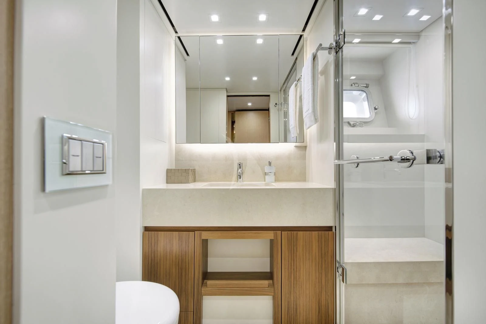 a bathroom with a mirror aboard THERAPY Yacht for Sale