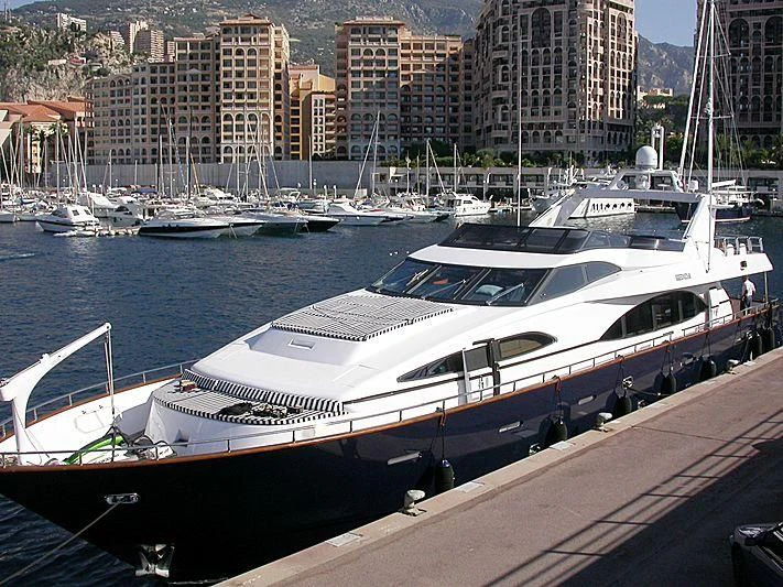 a boat docked at a pier aboard SPECTRE Yacht for Sale