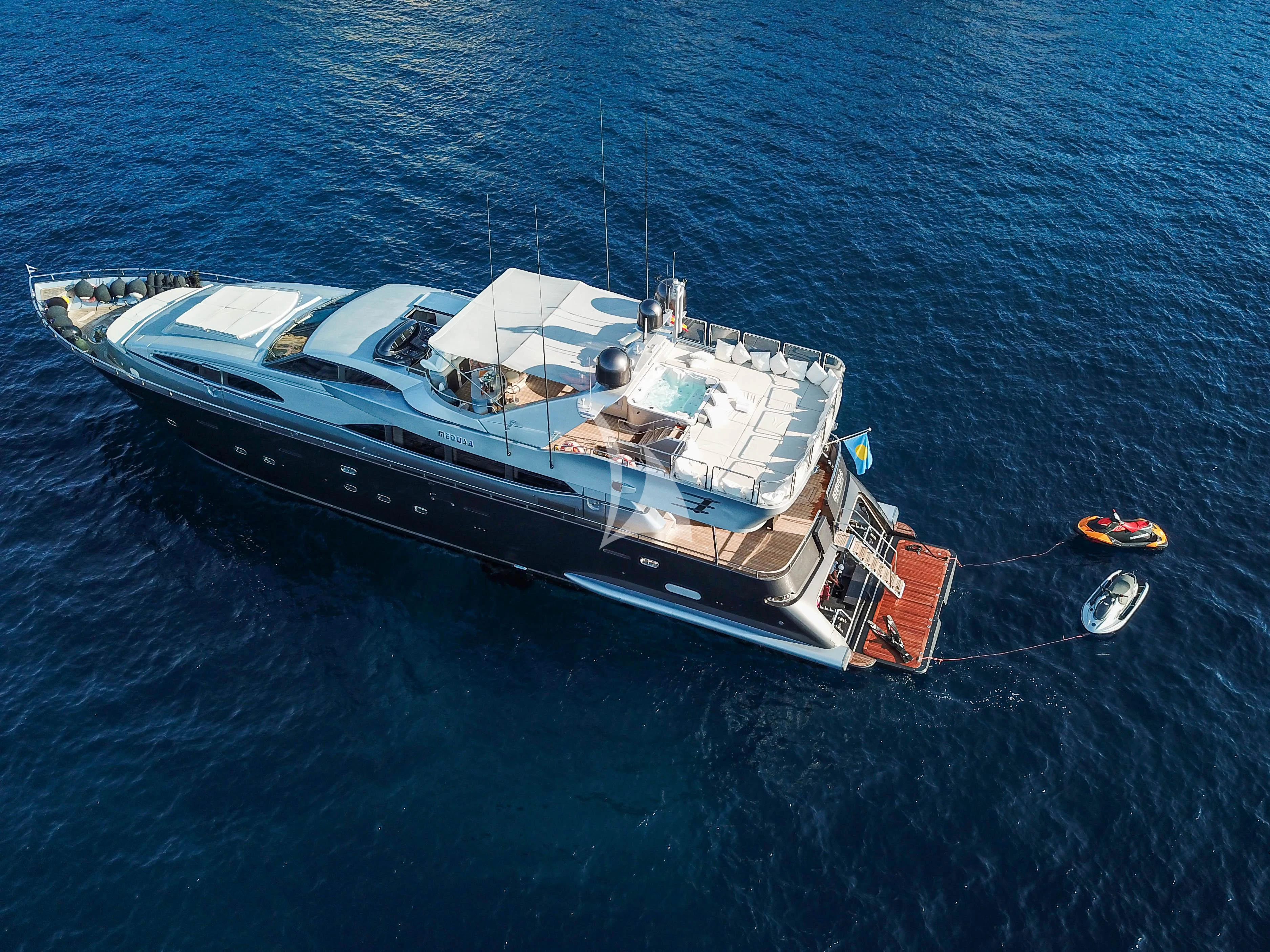 a large ship in the water aboard SPECTRE Yacht for Sale