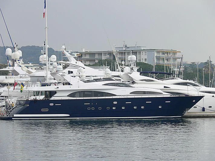 a large boat in the water aboard SPECTRE Yacht for Sale