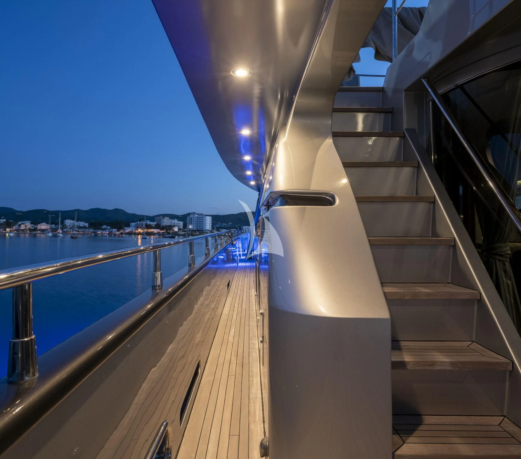 a staircase leading to a beach aboard SPECTRE Yacht for Sale
