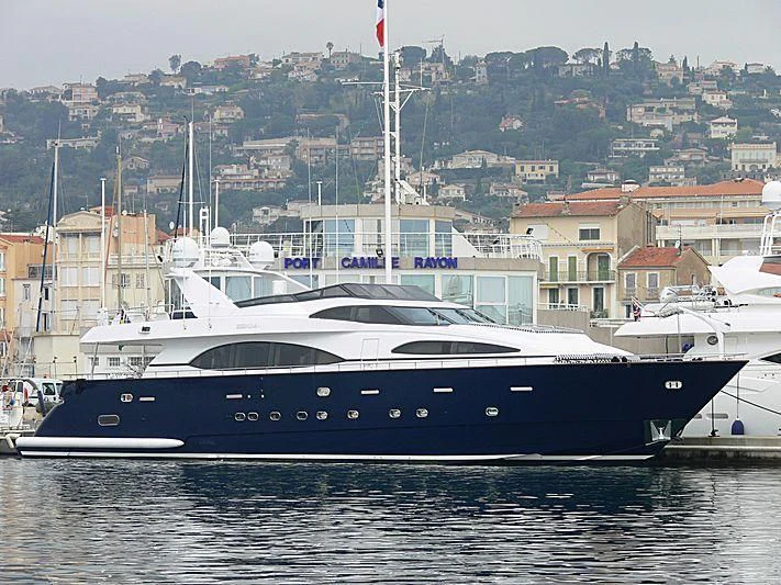 a large boat in the water aboard SPECTRE Yacht for Sale