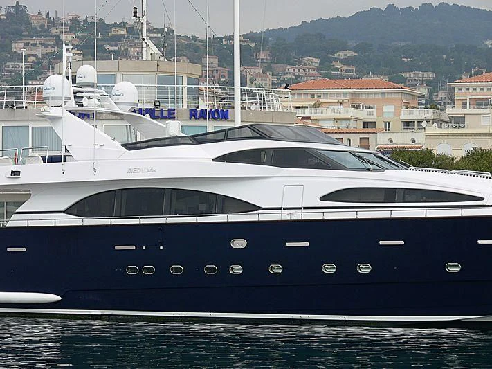 a large white yacht aboard SPECTRE Yacht for Sale