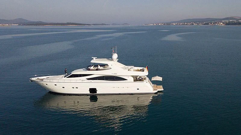 a white yacht in the water aboard NEOSTAR Yacht for Sale