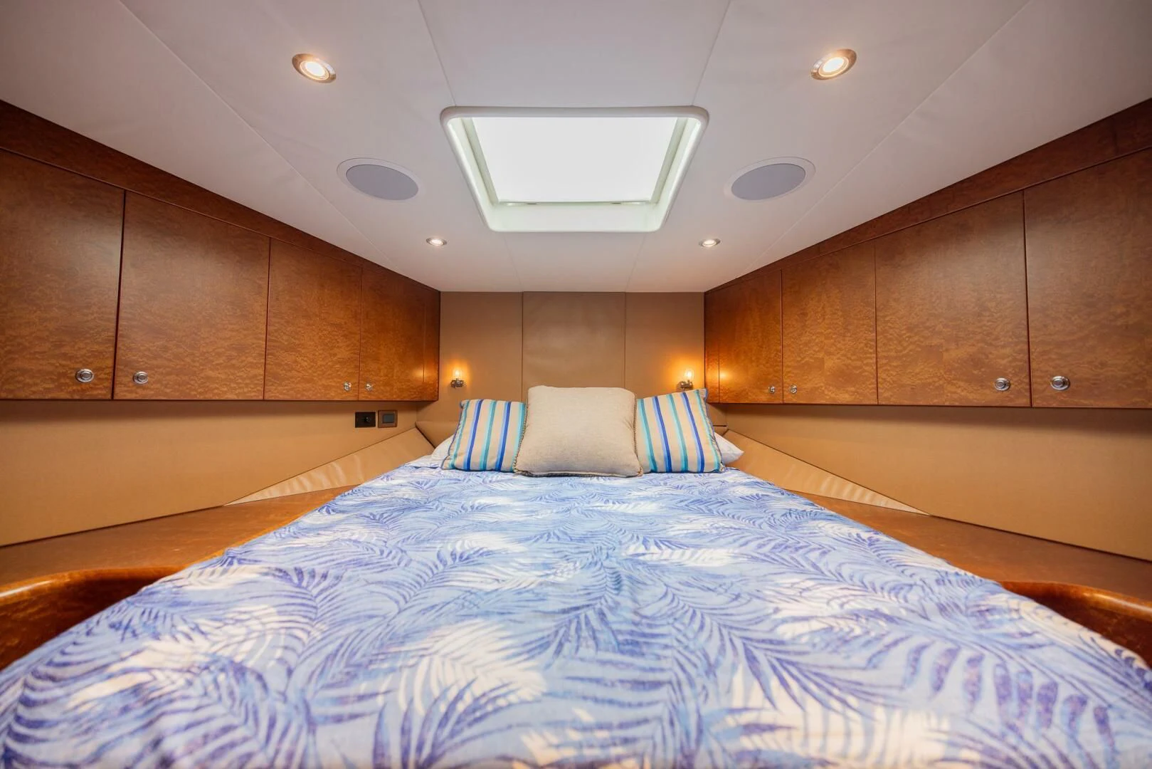a large bed in a room aboard PREDATOR I Yacht for Sale