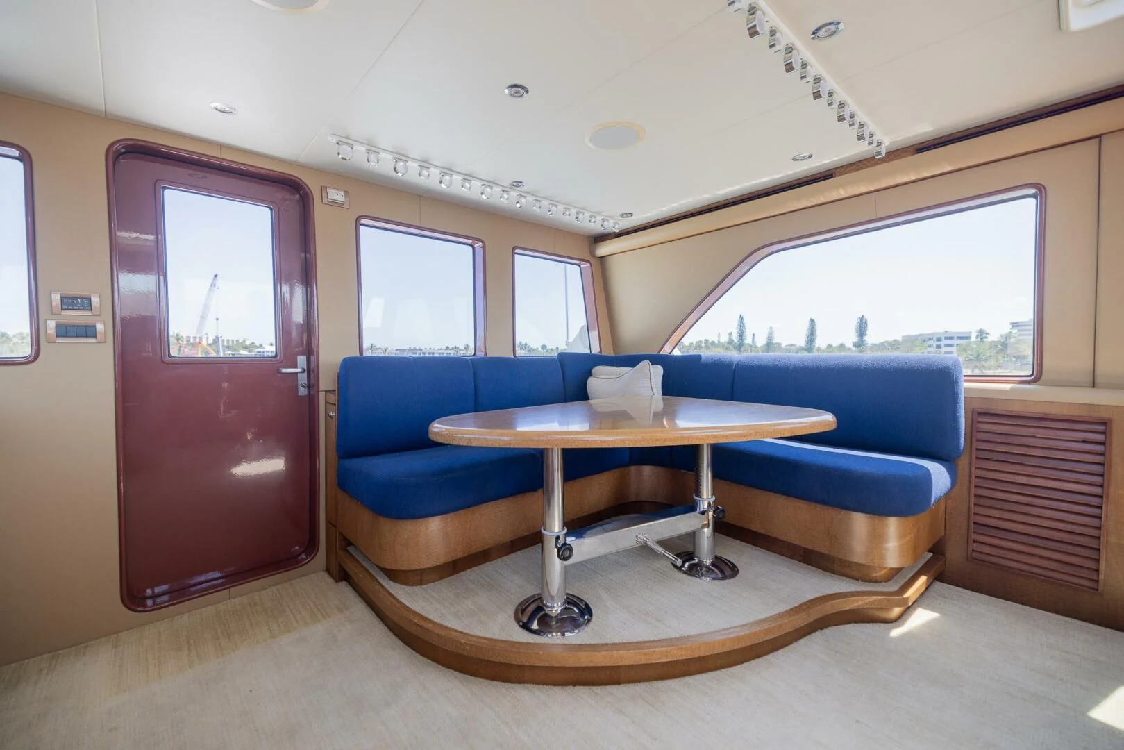 a room with a couch and a table aboard PREDATOR I Yacht for Sale